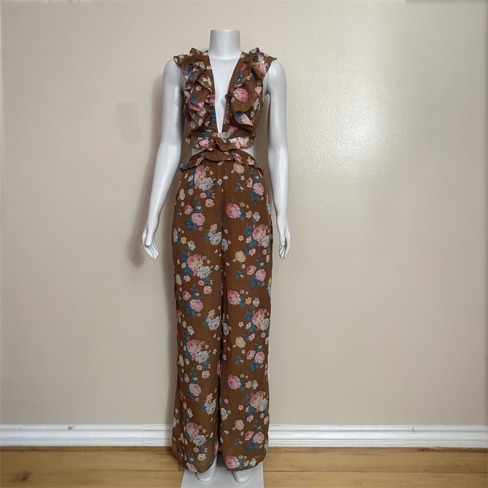 Brown multi floral straight leg crisscross back jumpsuit with ruffle details